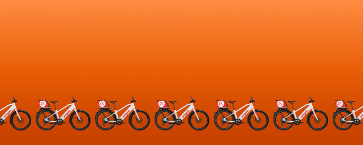 Pickebike Lieferflotte mit identischen E-Cargo-Bikes. UpVolt Basel betreut Geschäftskunden mit Akku-Service und Flottenwartung
